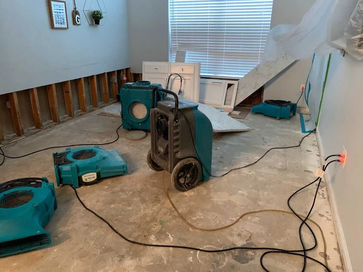 Dehumidifier in flood-cut room for Water Damage Restoration in Deerfield
